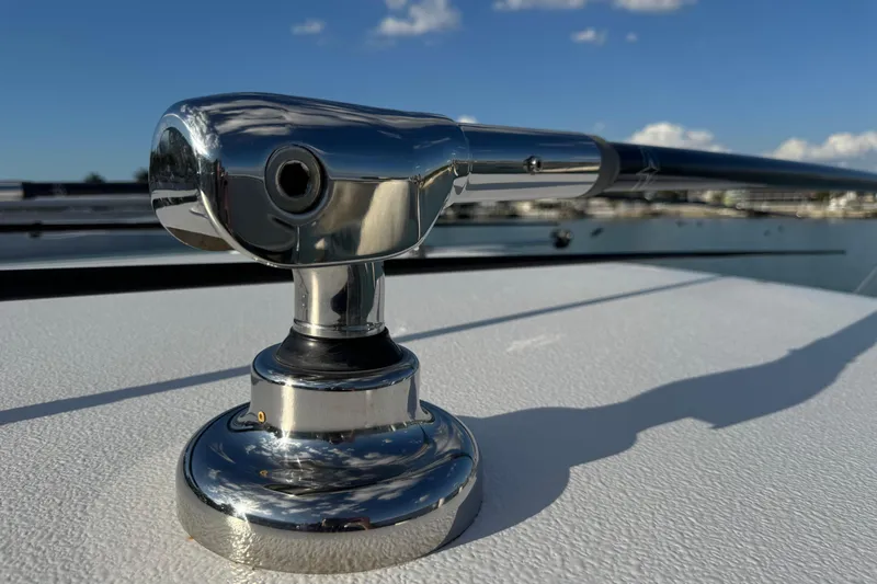 High Steaks Yacht Photos Pics Close-up of a chrome fitting on a 2024 Jupiter 38 HFS boat under blue sky.
