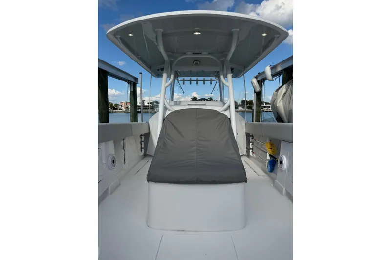 High Steaks Yacht Photos Pics 2024 Jupiter 38 HFS boat interior with cushioned seating and overhead canopy.