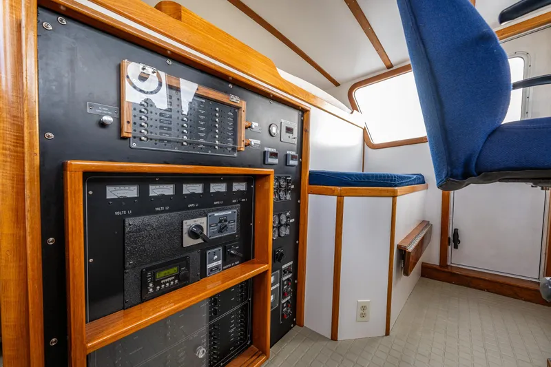 Single Star Yacht Photos Pics Control panel and seating inside a 1978 Hidden Harbor Custom Trawler boat.