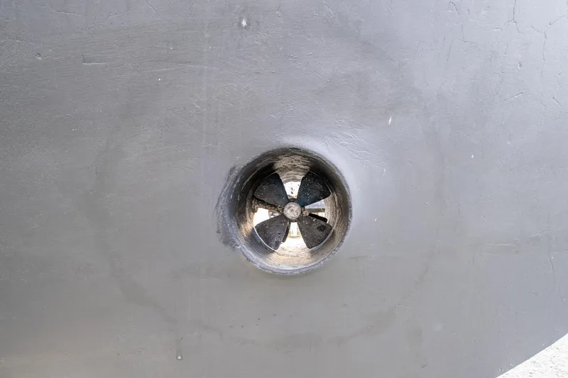 Single Star Yacht Photos Pics Bow thruster of 1978 Hidden Harbor Custom Trawler, close-up view.