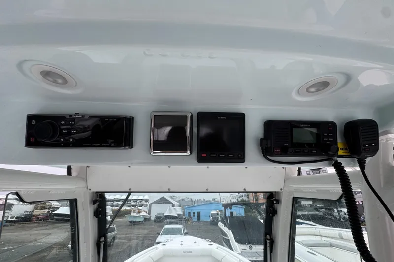  Yacht Photos Pics 2019 Everglades 273 Center Console dashboard with navigation and communication equipment.