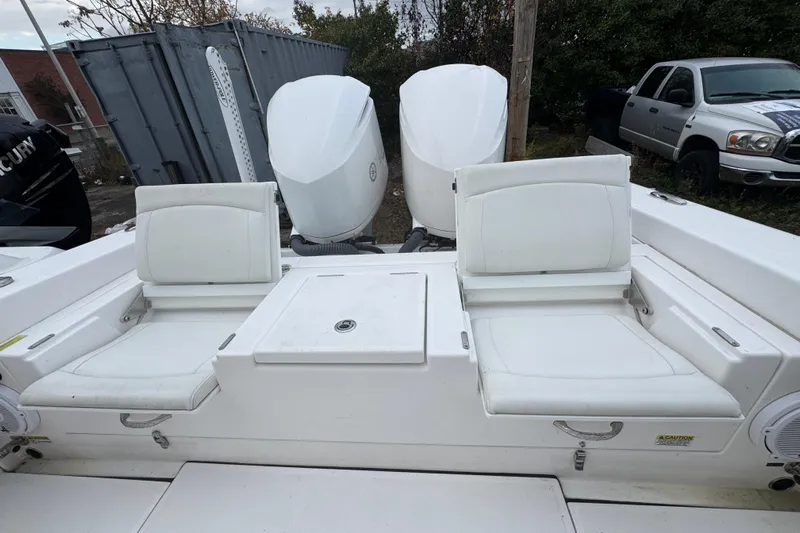  Yacht Photos Pics 2019 Everglades 273 Center Console boat with dual engines and white seating.