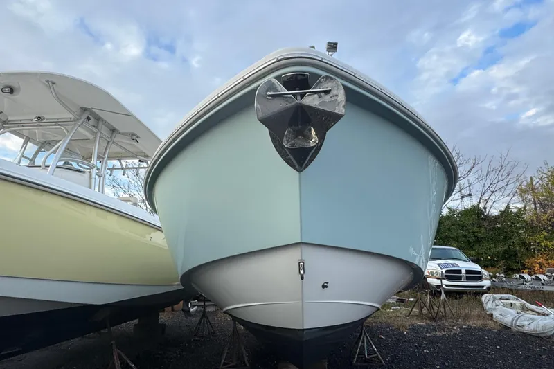  Yacht Photos Pics 2019 Everglades 273 Center Console boat on display, front view, outdoors.