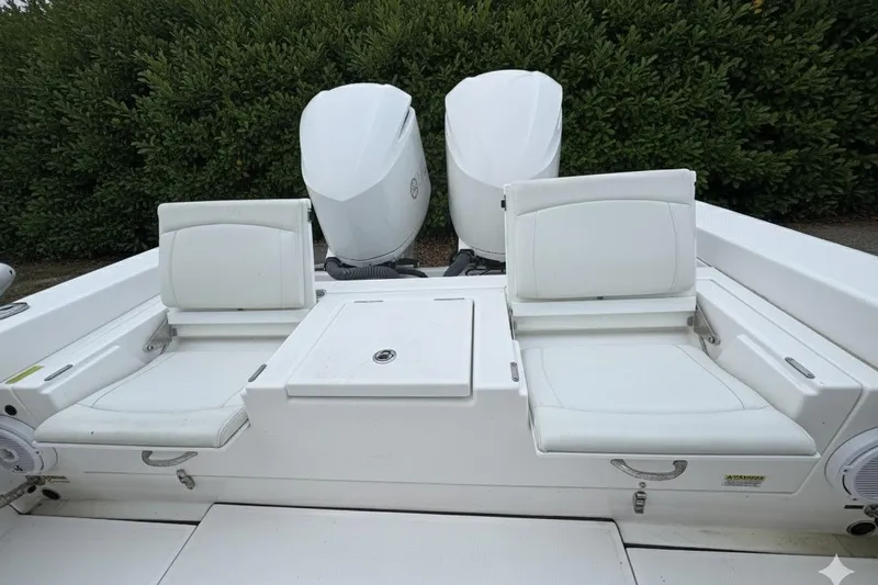  Yacht Photos Pics 2019 Everglades 273 Center Console boat with dual engines and white seating.