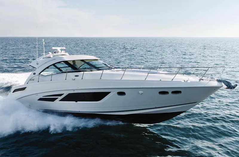  Yacht Photos Pics Manufacturer Provided Image: 2014 Sea Ray 540 Sundancer yacht cruising on open water.