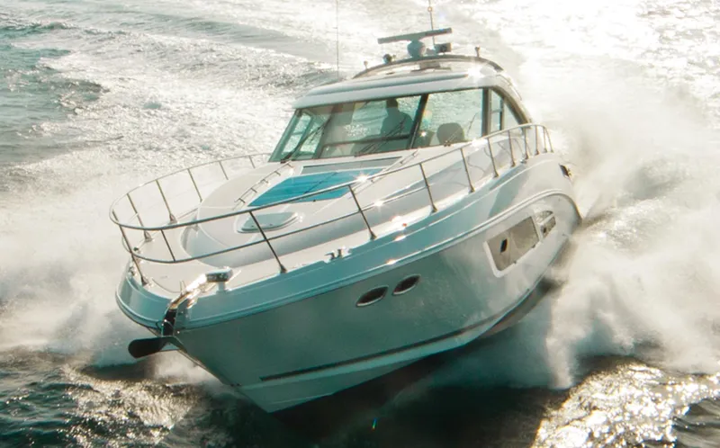  Yacht Photos Pics Manufacturer Provided Image: 2014 Sea Ray 540 Sundancer yacht cruising on open water.