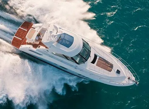  Yacht Photos Pics Manufacturer Provided Image: 2014 Sea Ray 540 Sundancer yacht cruising on open water.