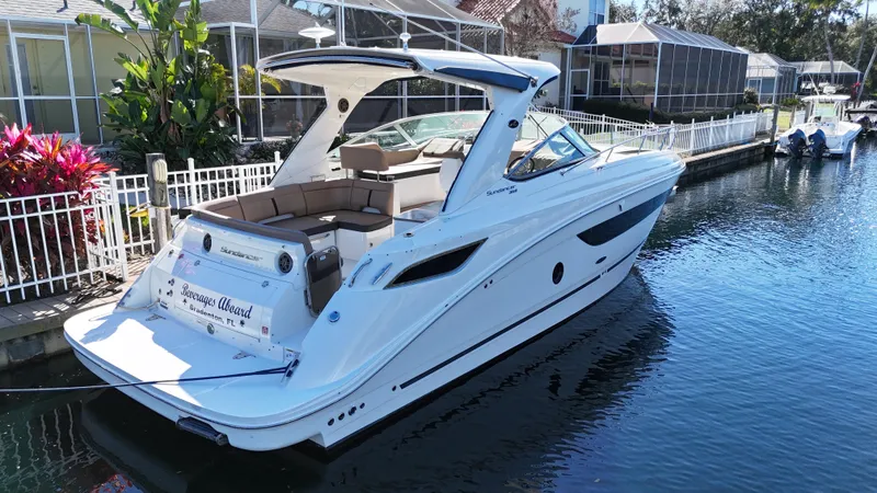  Yacht Photos Pics 2016 Sea Ray 350 Sundancer luxury yacht docked by waterfront homes.