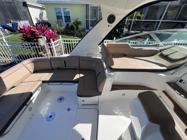  Yacht Photos Pics 2016 Sea Ray 350 Sundancer boat interior with beige seating and modern design.