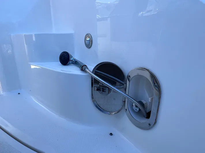 Yacht Photos Pics 2016 Sea Ray 350 Sundancer deck shower with chrome fixtures.