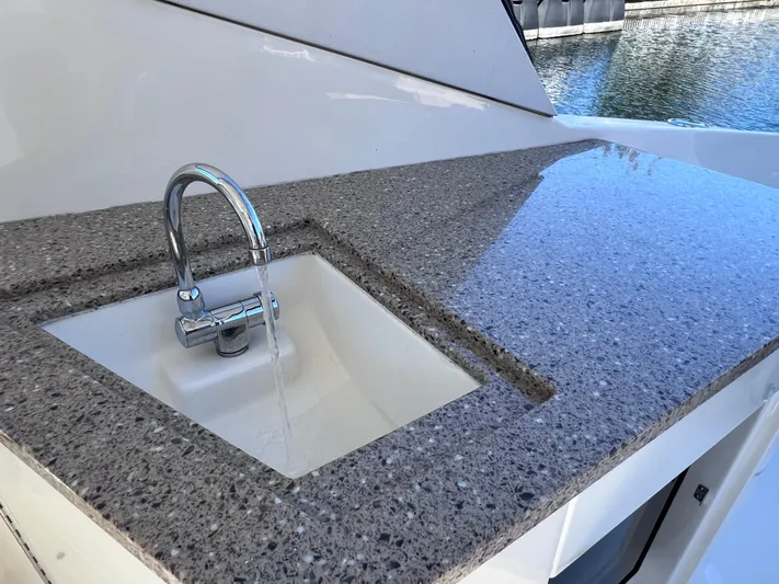  Yacht Photos Pics Granite countertop with sink on 2016 Sea Ray 350 Sundancer yacht.