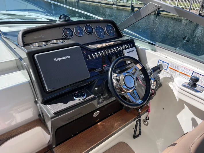  Yacht Photos Pics 2016 Sea Ray 350 Sundancer boat dashboard with Raymarine navigation system.