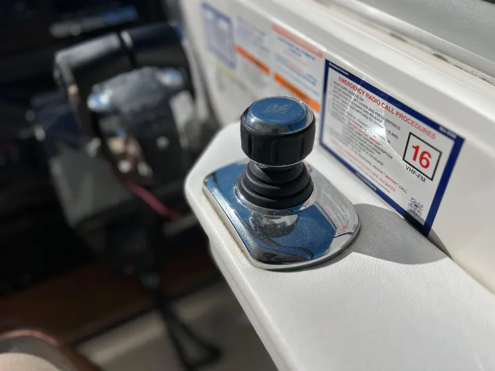  Yacht Photos Pics Close-up of 2016 Sea Ray 350 Sundancer boat control panel and joystick.