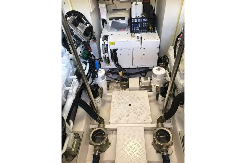  Yacht Photos Pics Engine room of 2020 Sundeck Yachts 580, showcasing mechanical components and equipment.