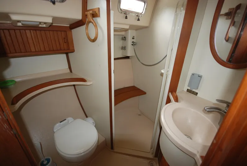 Priva Sea Yacht Photos Pics 2003 Island Packet 485 yacht bathroom with shower, sink, and toilet.