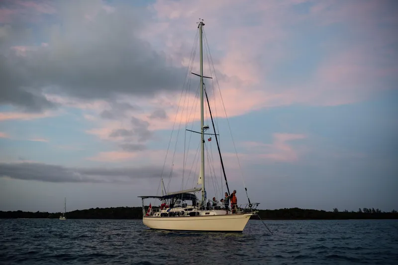 Priva Sea Yacht Photos Pics Sailboat Island Packet 485, 2003 model, on calm waters at sunset.