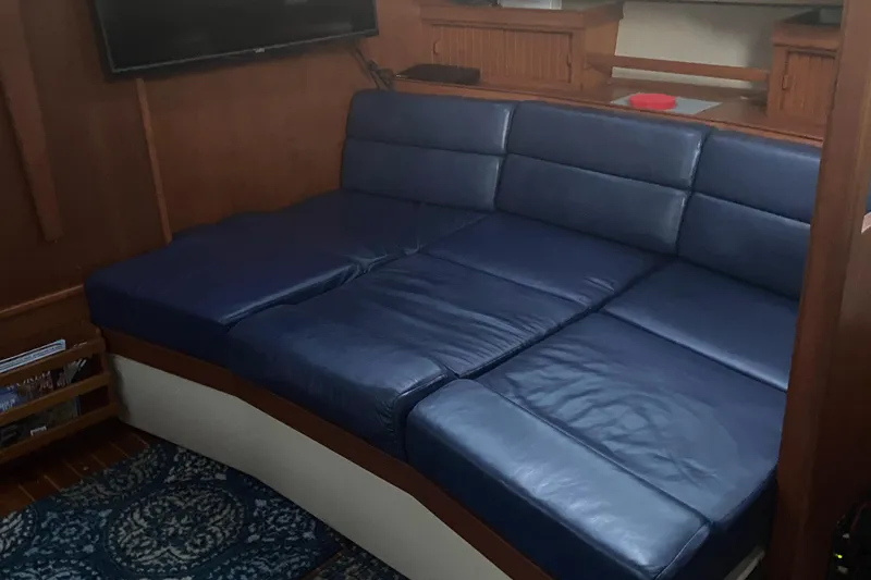 Priva Sea Yacht Photos Pics Luxurious blue leather seating in 2003 Island Packet 485 yacht interior.