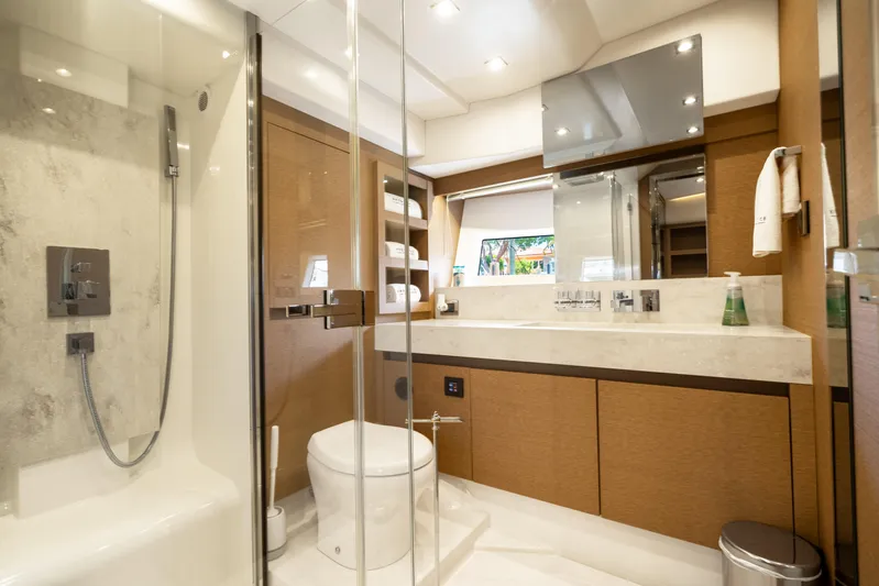  Yacht Photos Pics Luxurious bathroom in 2018 Prestige 680 yacht, featuring modern fixtures and elegant design.