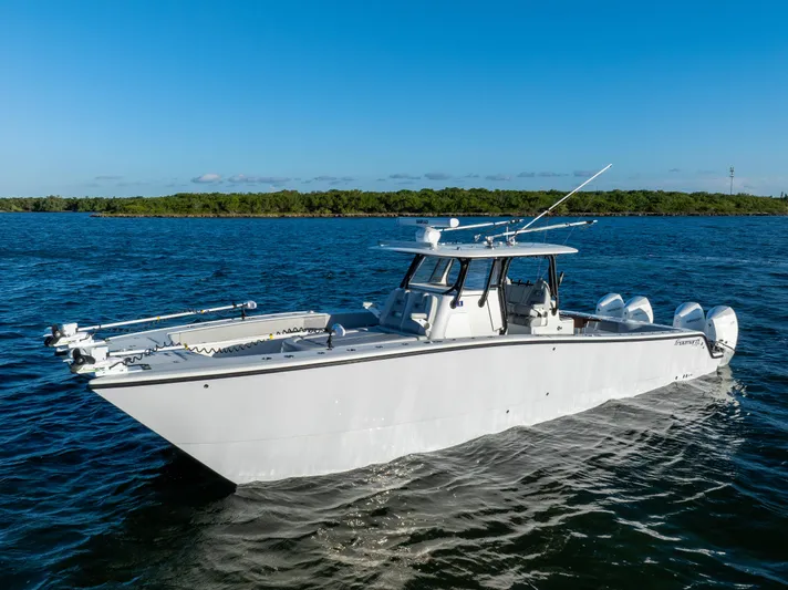  Yacht Photos Pics 2020 Freeman 37 VH boat cruising on open water under clear blue sky.