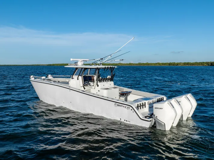  Yacht Photos Pics 2020 Freeman 37 VH boat on open water, featuring twin Mercury engines.