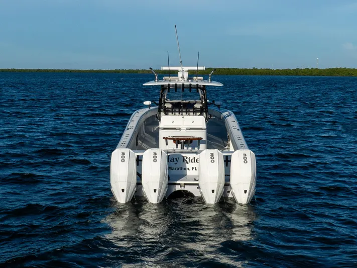  Yacht Photos Pics Freeman 37 VH 2020 boat with four engines on open water.