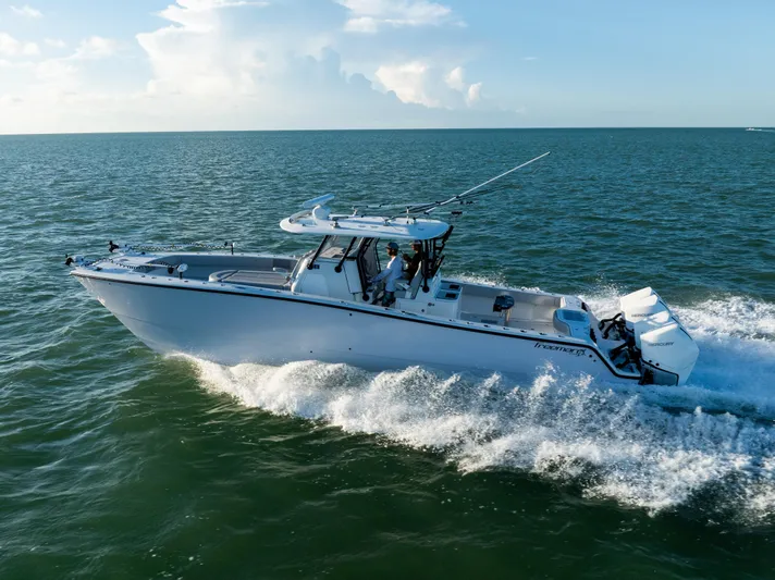  Yacht Photos Pics Freeman 37 VH 2020 boat cruising on open water under clear skies.