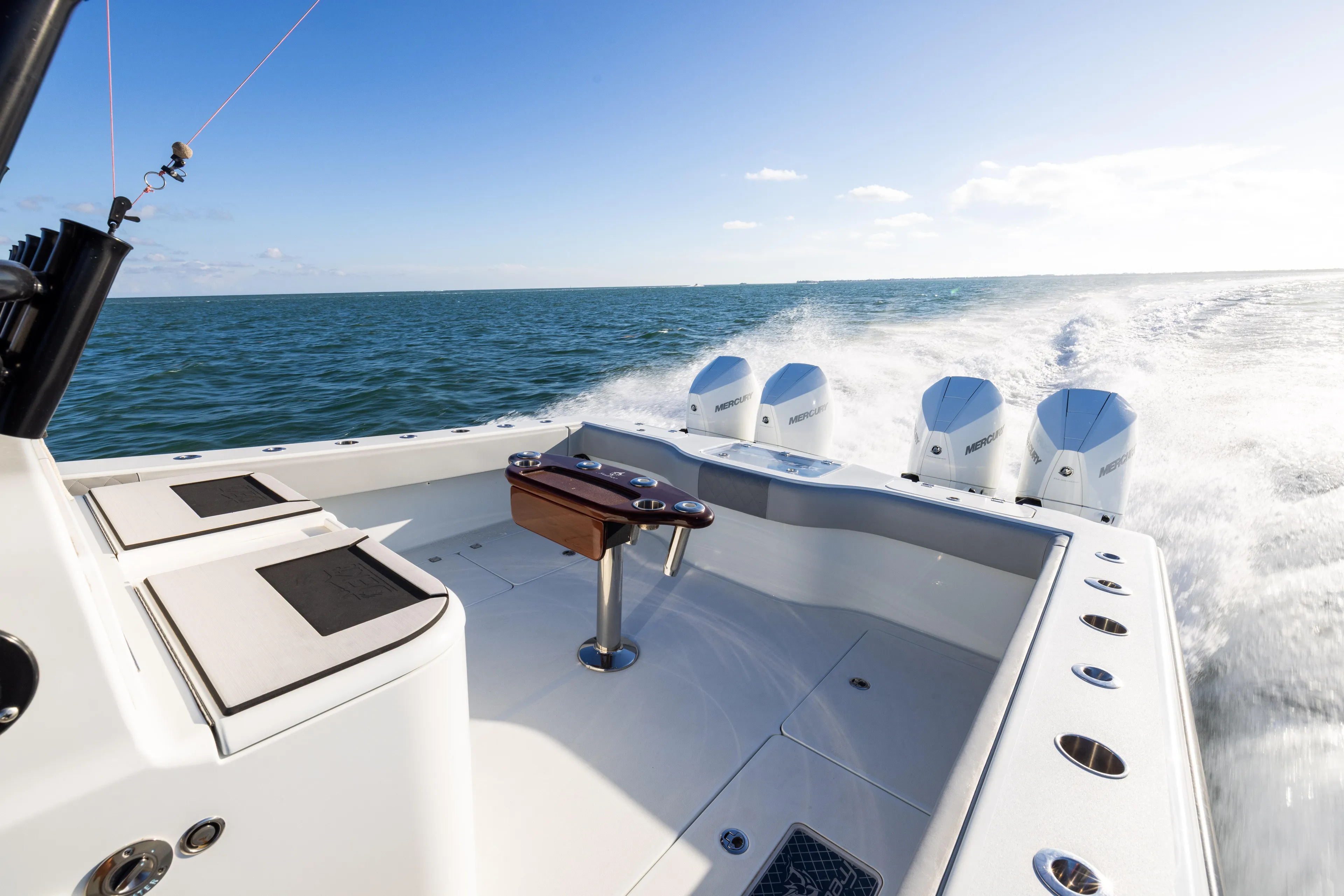  Yacht Photos Pics Freeman 37 VH 2020 boat cruising on open water with four engines.