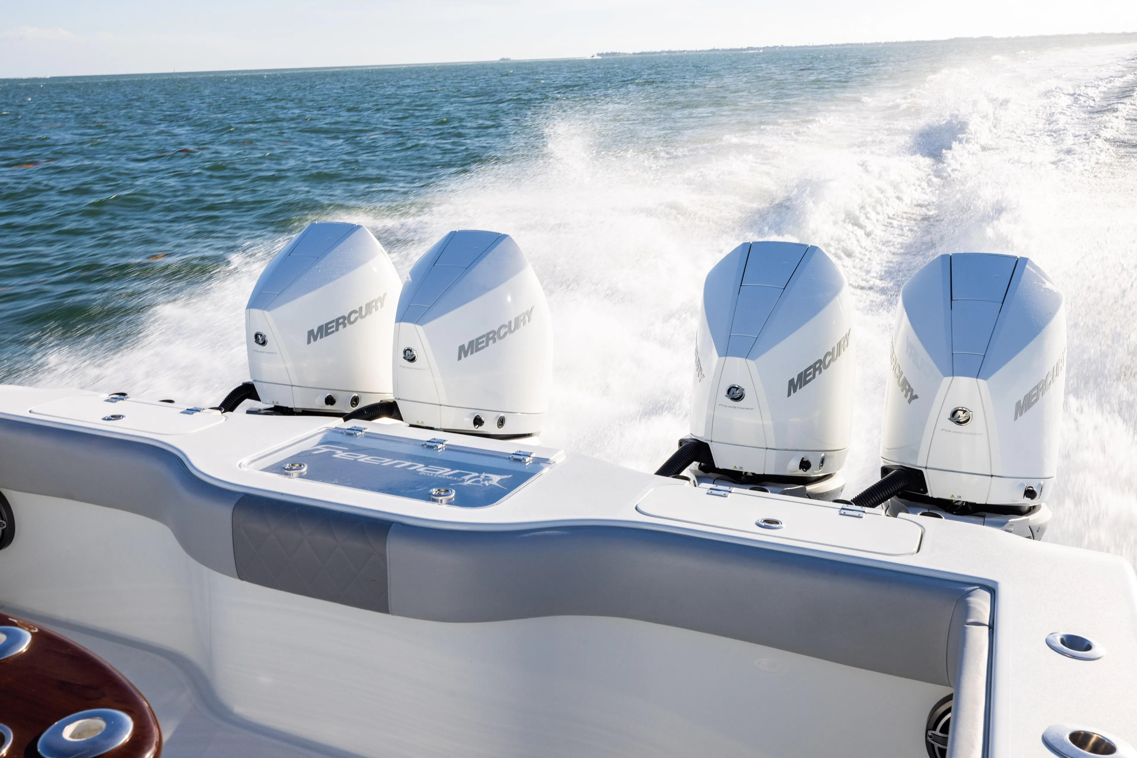  Yacht Photos Pics Freeman 37 VH boat with four Mercury outboard engines cruising on open water, 2020 model.