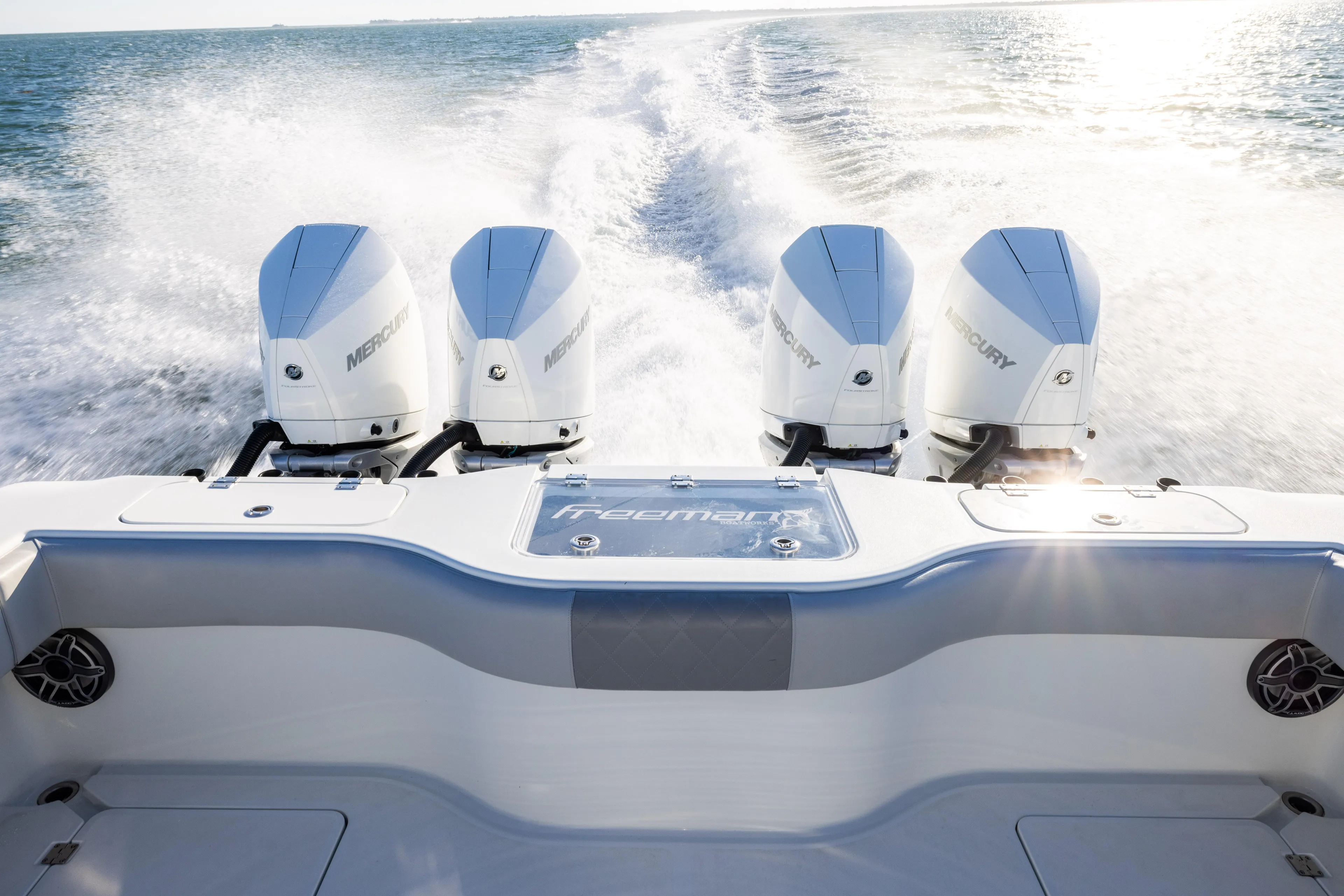  Yacht Photos Pics Freeman 37 VH 2020 boat with four Mercury engines speeding on water.