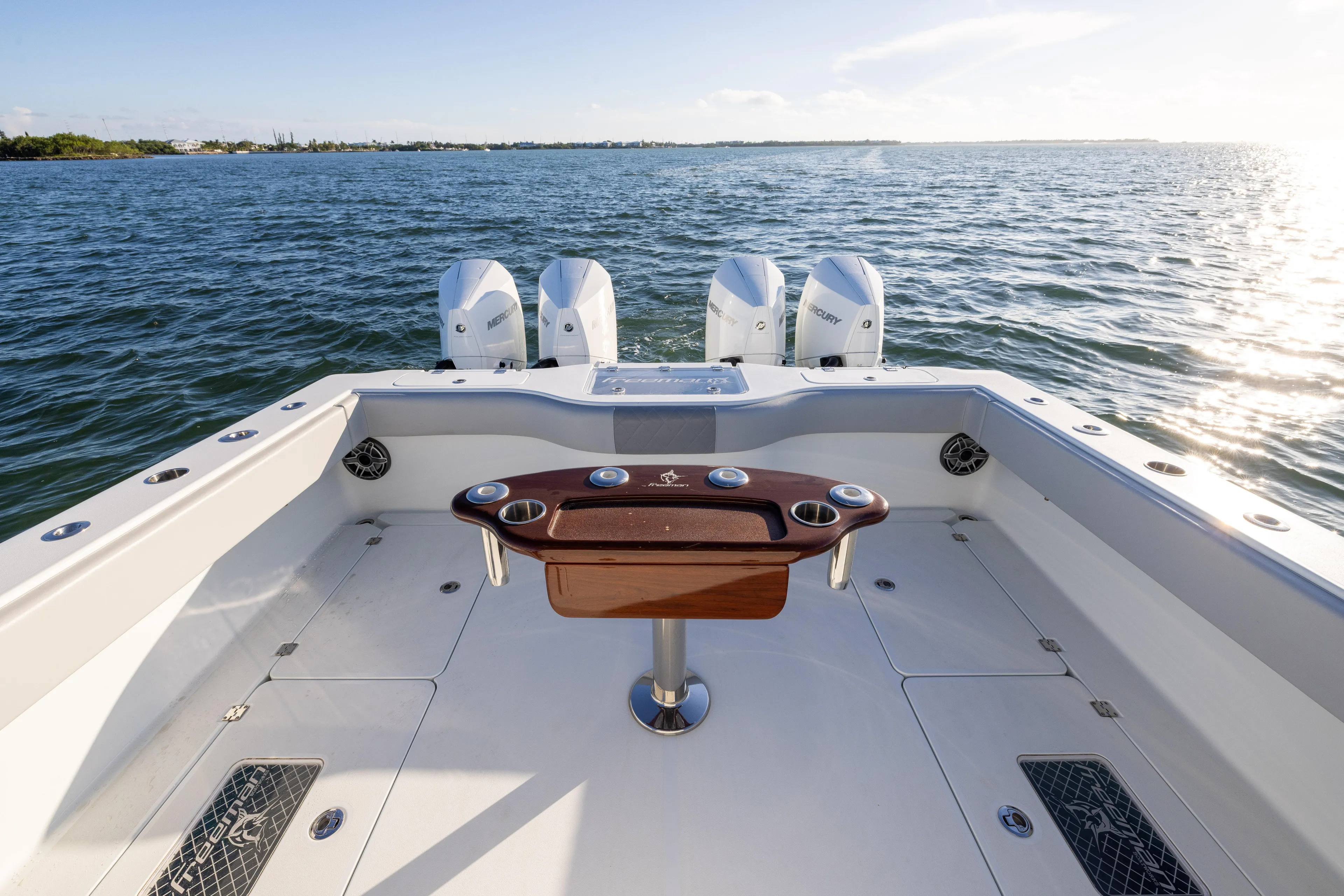  Yacht Photos Pics 2020 Freeman 37 VH boat deck with dual Mercury engines on open water.