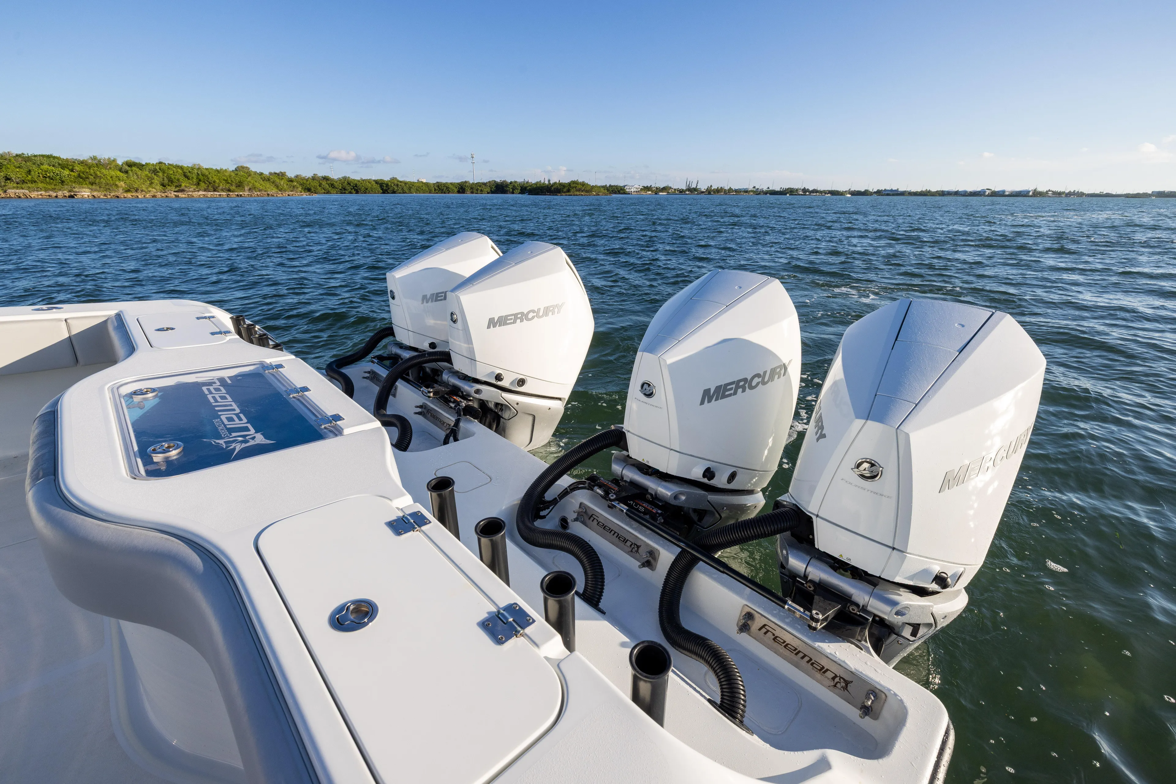  Yacht Photos Pics Freeman 37 VH 2020 boat with triple Mercury outboard engines on open water.