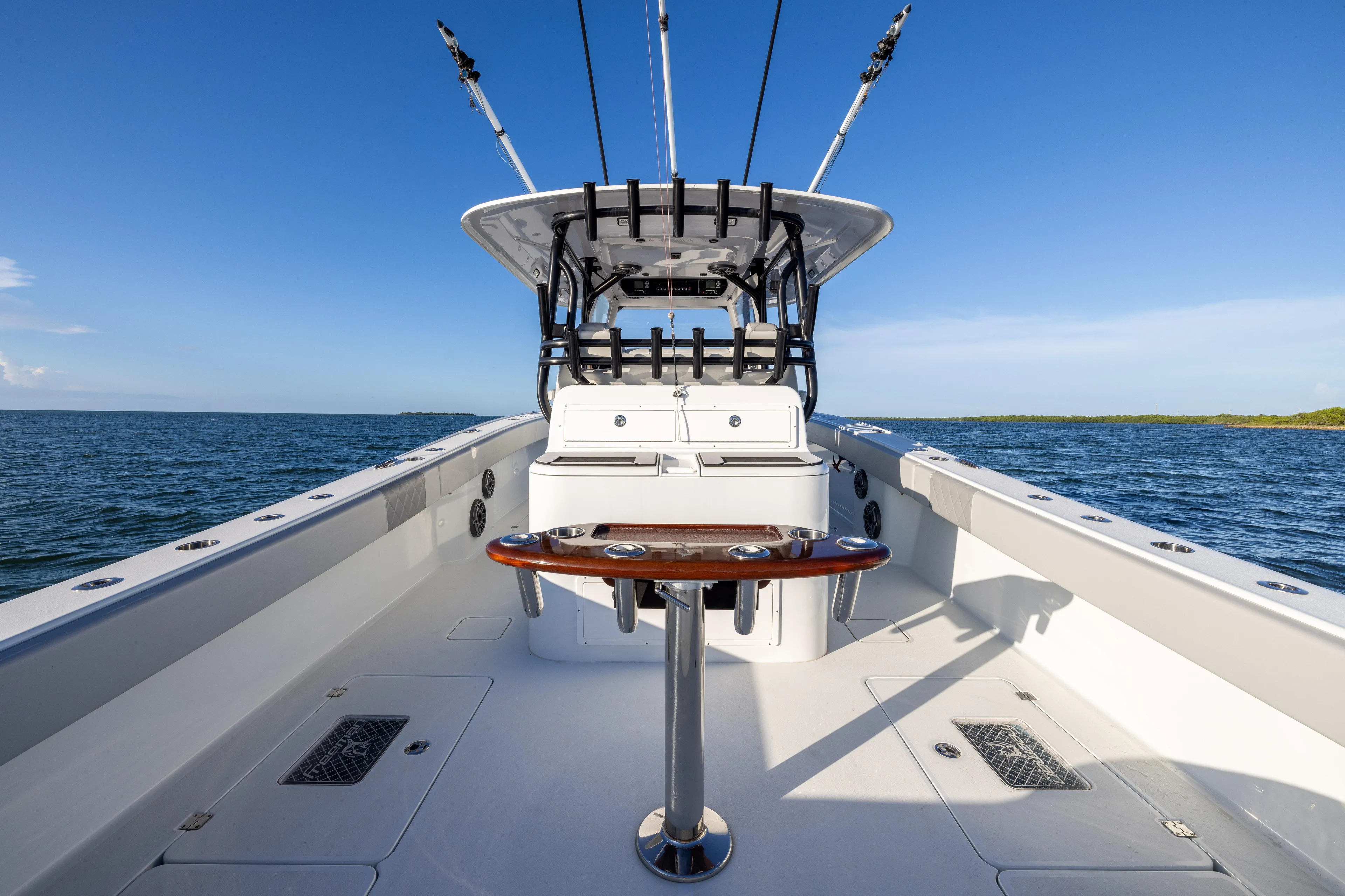  Yacht Photos Pics Freeman 37 VH 2020 boat on open water, featuring spacious deck and fishing equipment.