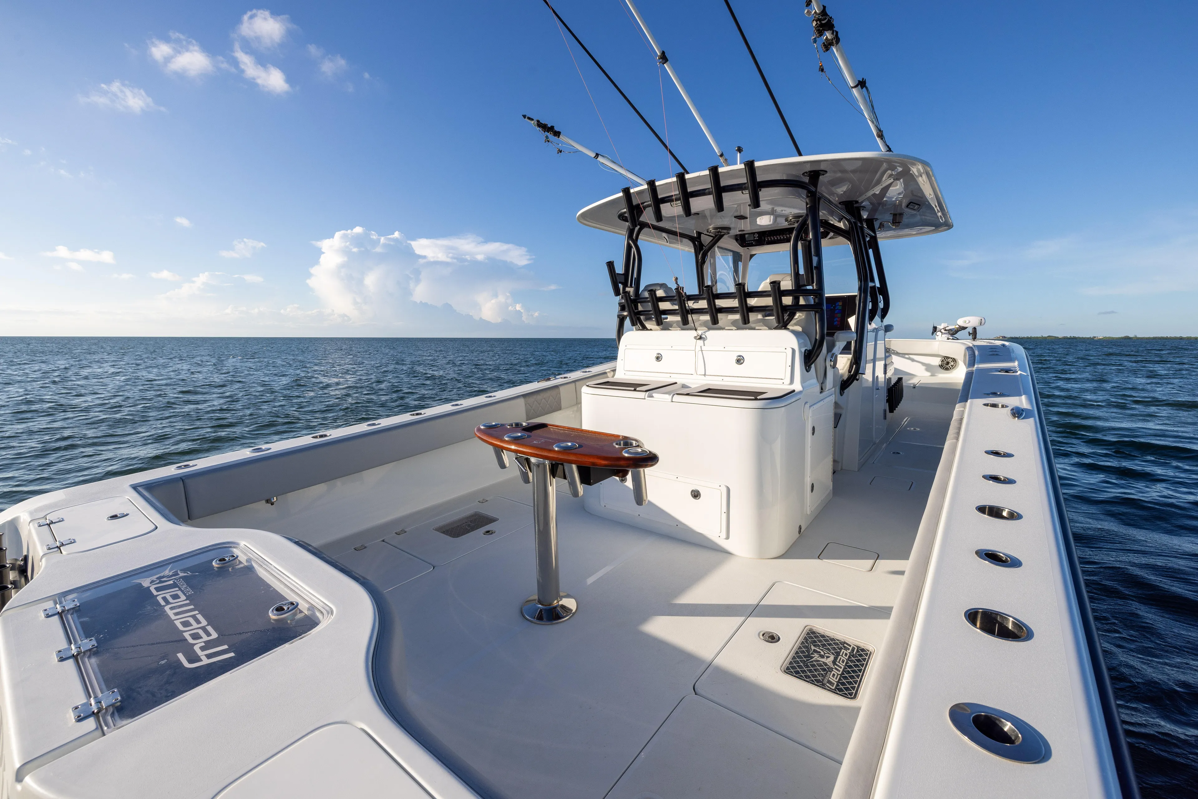  Yacht Photos Pics Freeman 37 VH 2020 boat on open water, featuring spacious deck and fishing equipment.