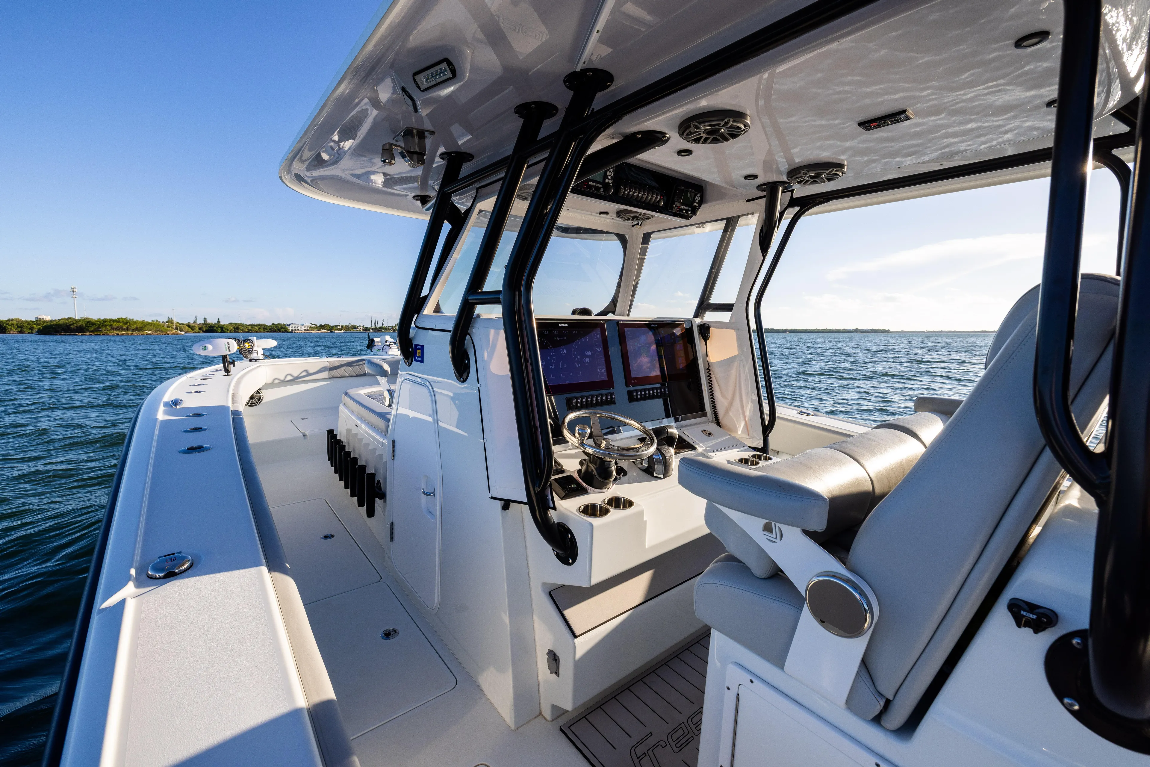  Yacht Photos Pics 2020 Freeman 37 VH boat interior with modern helm, dual seats, and ocean view.