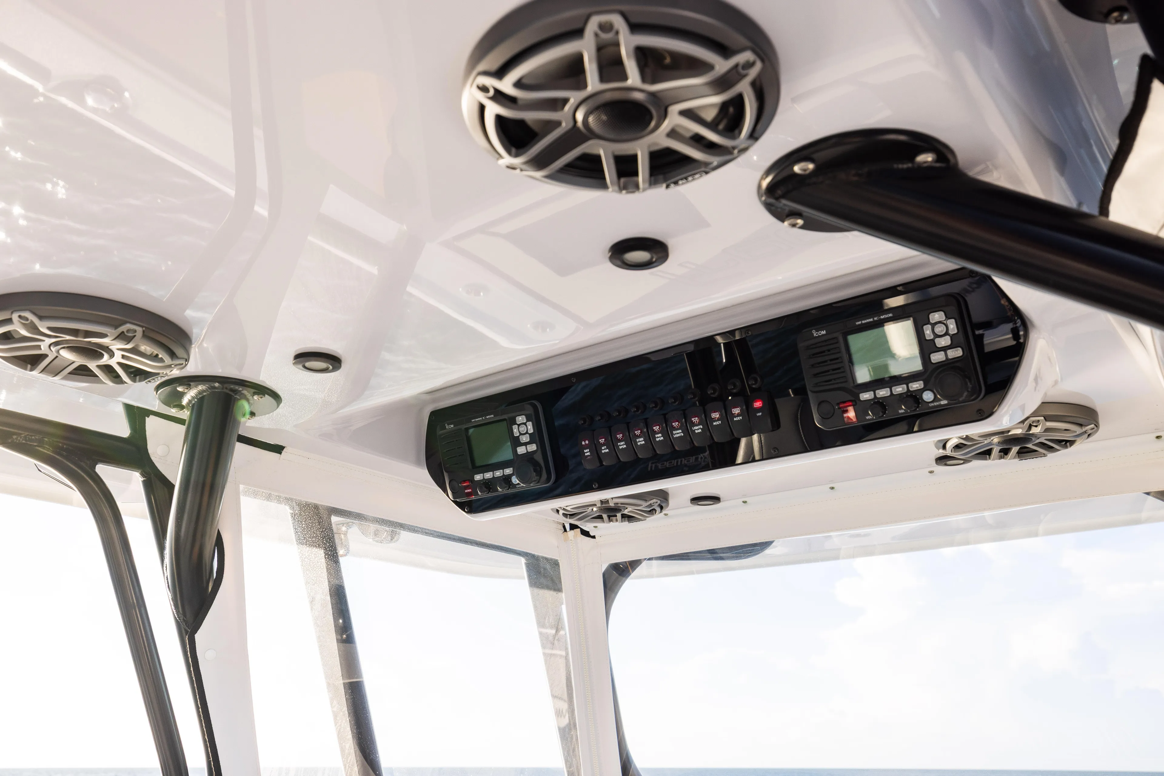  Yacht Photos Pics Interior view of 2020 Freeman 37 VH boat, featuring control panel and speakers.