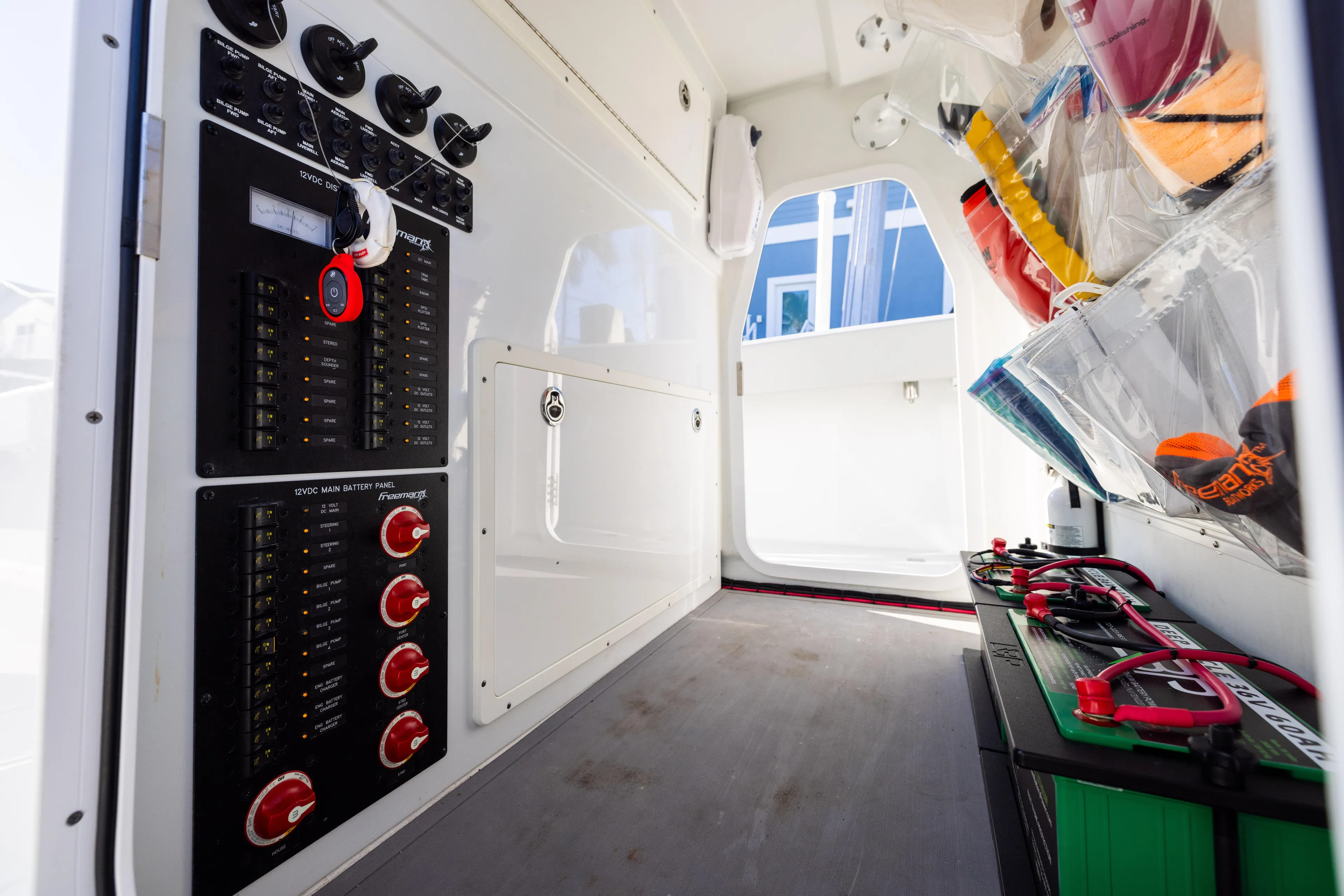  Yacht Photos Pics Interior view of a 2020 Freeman 37 VH boat showing control panels and storage.