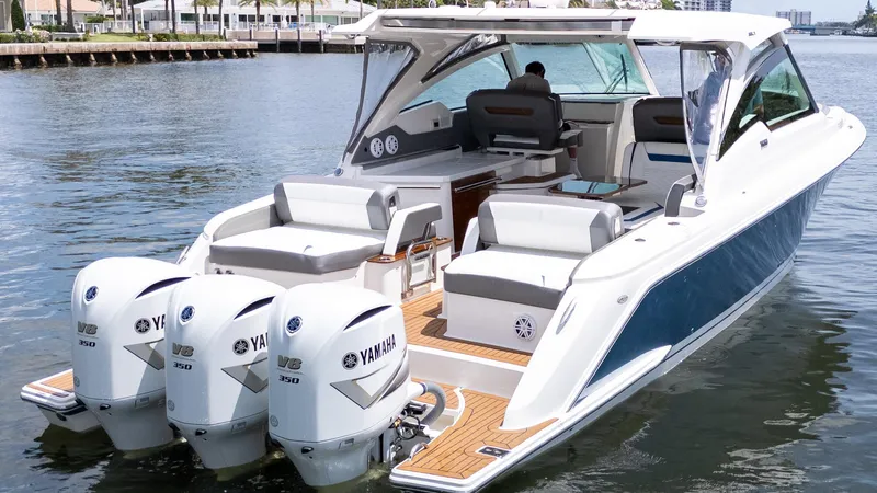  Yacht Photos Pics 2021 Tiara Sport 38 LX boat with triple Yamaha V8 engines on water.