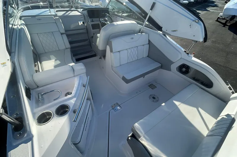  Yacht Photos Pics 2024 Regal 28 Express boat interior with luxurious seating and modern amenities.