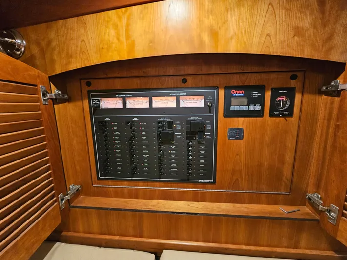 Ocean Breeze Yacht Photos Pics ELECTRICAL DISTRIBUTION PANEL, GENSET CONTROL PANEL, & FRESHWATER LEVEL GAUGE