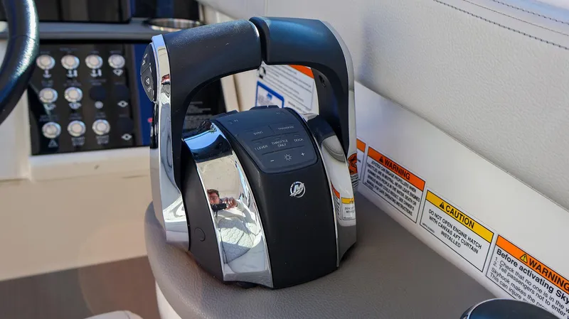 4743jg Yacht Photos Pics Throttle controls on 2021 Sea Ray 320 Sundancer boat dashboard.