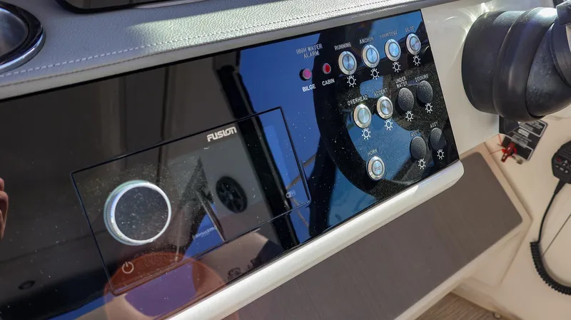 4743jg Yacht Photos Pics Control panel of 2021 Sea Ray 320 Sundancer boat with Fusion audio system.