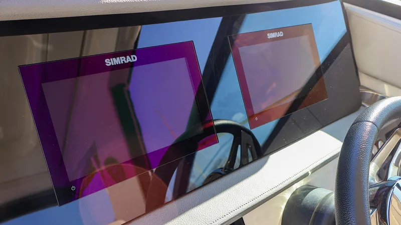 4743jg Yacht Photos Pics Simrad navigation screens on 2021 Sea Ray 320 Sundancer boat dashboard.