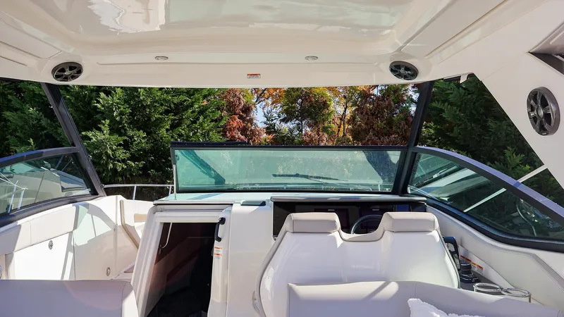 4743jg Yacht Photos Pics Interior view of 2021 Sea Ray 320 Sundancer boat with seating and open cabin.