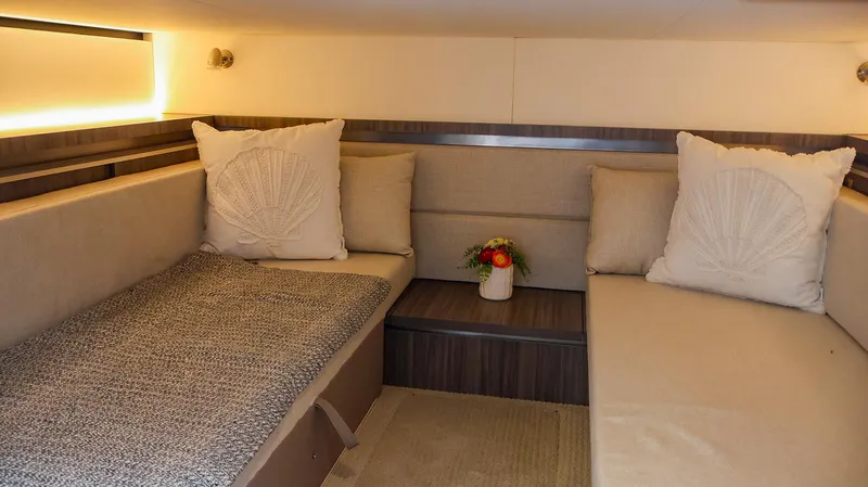 4743jg Yacht Photos Pics Luxurious interior of 2021 Sea Ray 320 Sundancer with cozy seating and elegant decor.