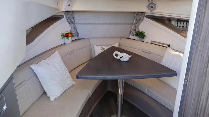 4743jg Yacht Photos Pics Luxurious interior of 2021 Sea Ray 320 Sundancer with elegant seating and decor.