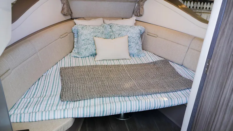 4743jg Yacht Photos Pics Cozy cabin interior of 2021 Sea Ray 320 Sundancer with plush bedding.