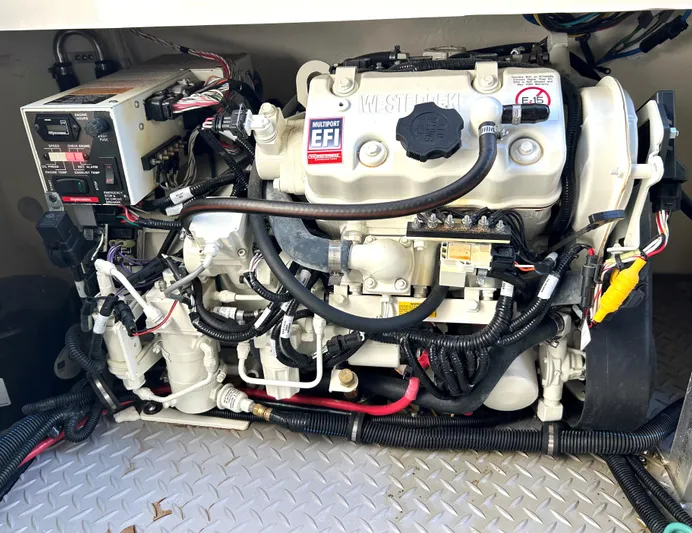 4743jg Yacht Photos Pics 2021 Sea Ray 320 Sundancer engine compartment with Westerbeke generator and electronic fuel injection system.