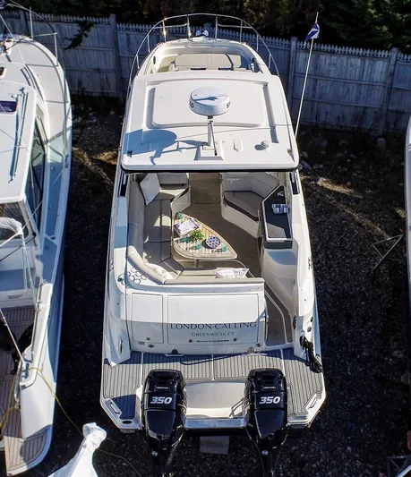 4743jg Yacht Photos Pics 2021 Sea Ray 320 Sundancer boat with twin 350 engines, docked and viewed from above.