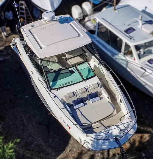 4743jg Yacht Photos Pics 2021 Sea Ray 320 Sundancer luxury motorboat docked aerial view.