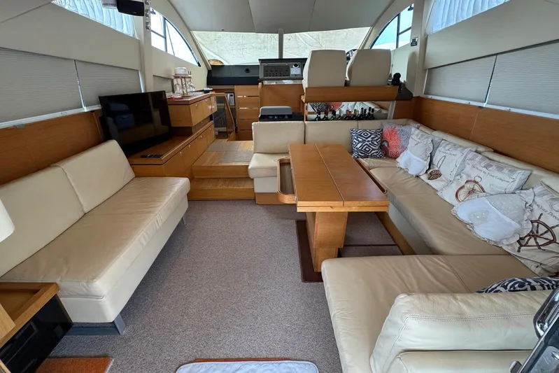 My Law Yacht Photos Pics Luxurious interior of 2007 Fairline Phantom 48 yacht with elegant seating and decor.